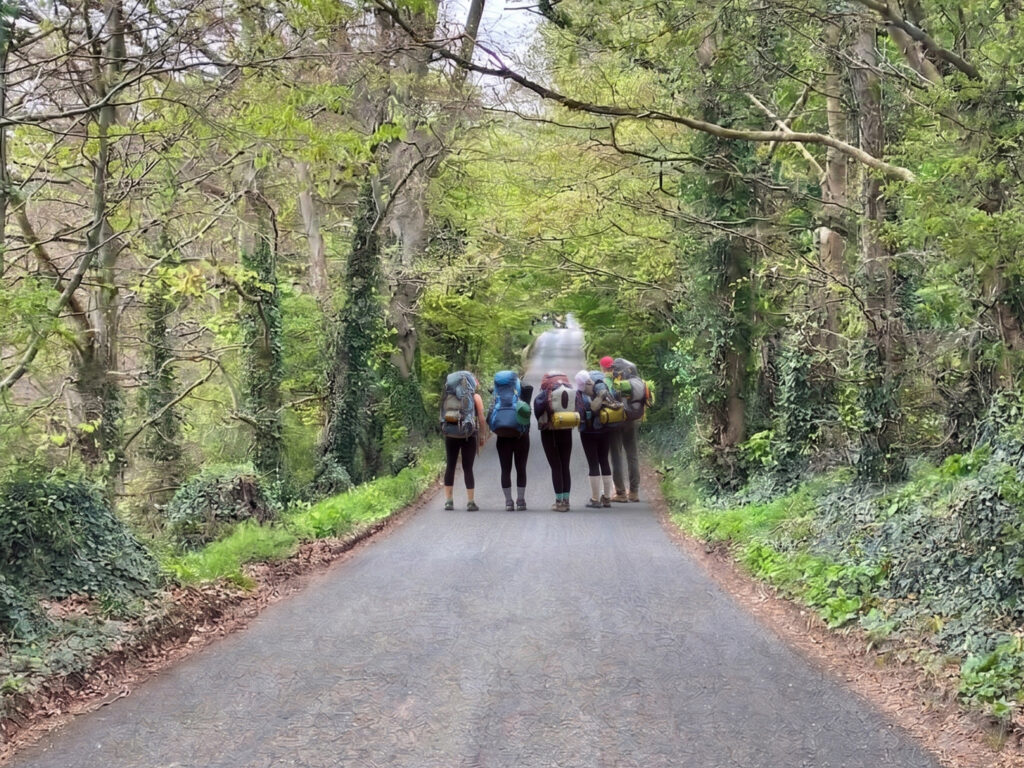 a team that works with cothelstone taking a walk through the cotherlstone area